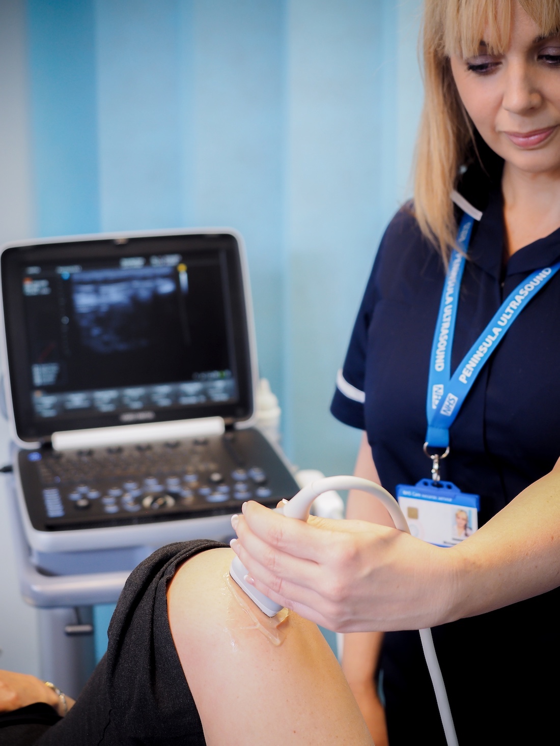 A photo of an ultrasound being preformed to show the services the company offers